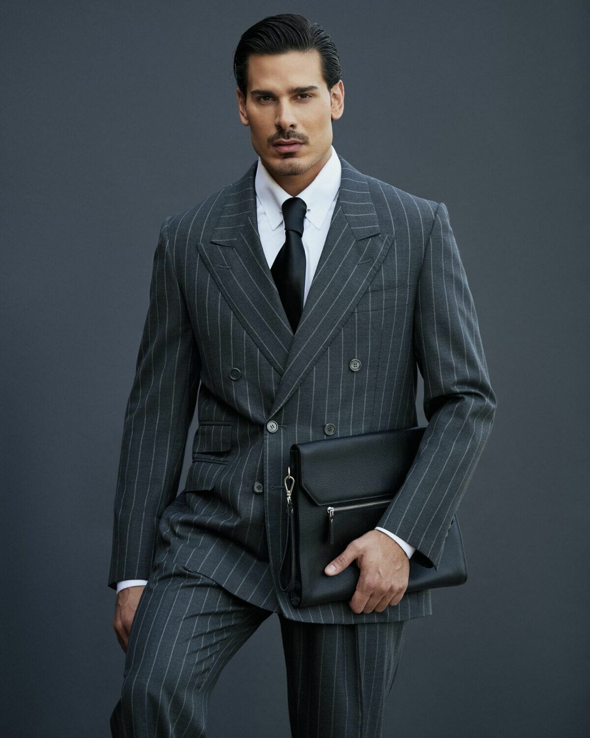 Double breasted pinstripe charcoal grey suit